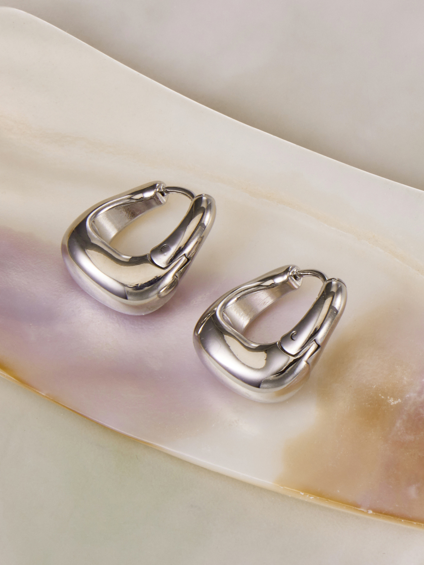 The Contour Hoop in tarnish-free waterproof stainless steel